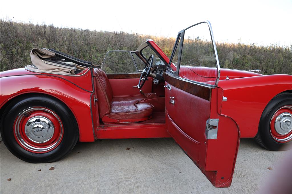 A 1955 Jaguar XK140 DHC